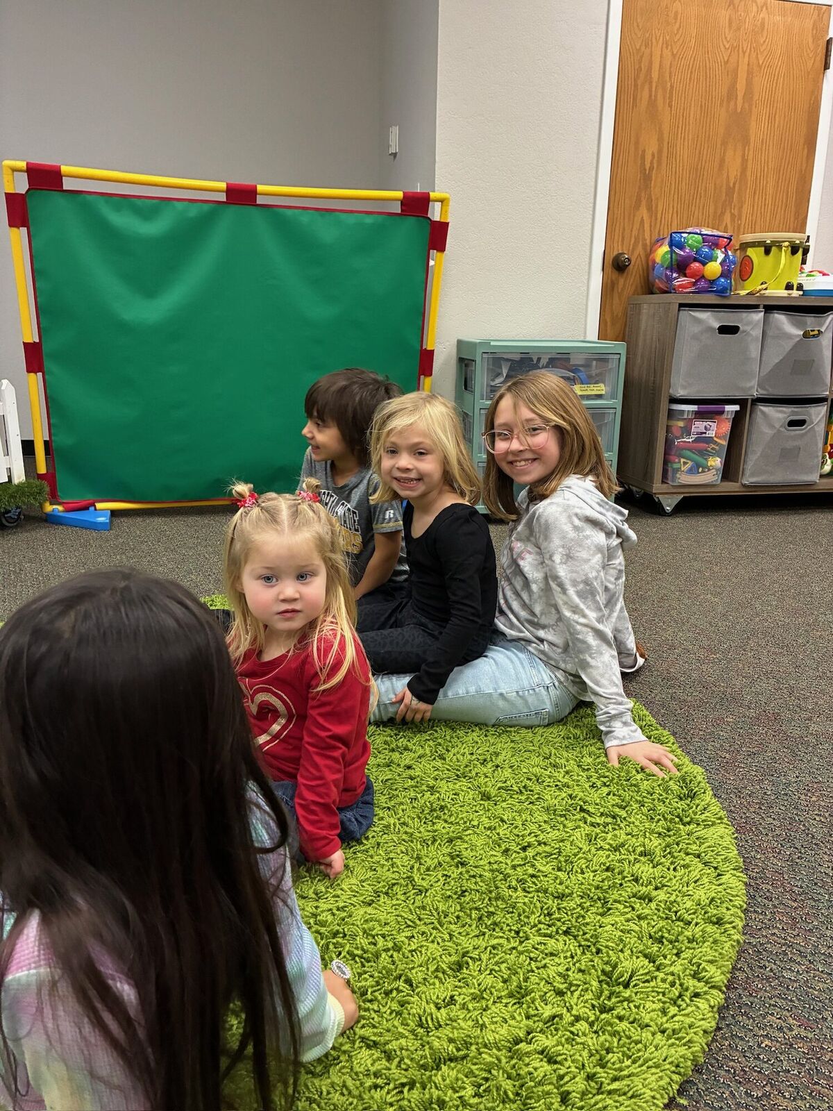 Toddlers playing in the Waumba Land room