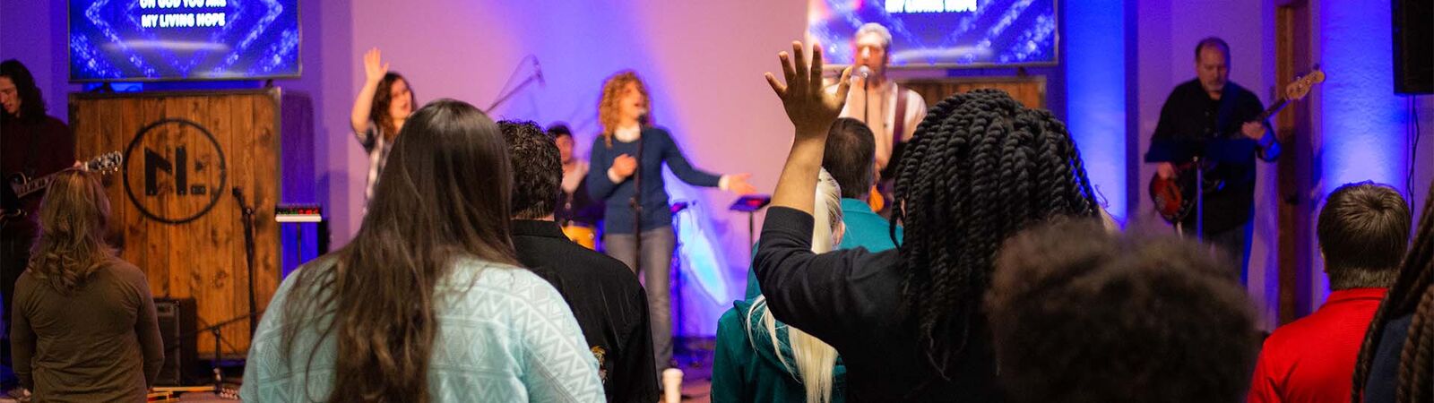 Hands raised in worship at Connect Church
